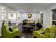 Bright living room featuring hardwood floors, modern furniture, and ample natural light at 11419 Leadenhall Ln, Charlotte, NC 28262