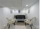 Inviting living room with neutral decor, a stylish sofa, and comfortable seating at 11419 Leadenhall Ln, Charlotte, NC 28262