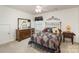 Inviting bedroom with classic furniture, a quilt-covered bed, and bright natural light at 1220 Kent Downs Sw Ave, Concord, NC 28027