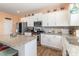 This kitchen features granite countertops, stainless steel appliances, and white cabinetry at 1220 Kent Downs Sw Ave, Concord, NC 28027