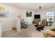 View of the living room showing the seating, decor, and accent lighting at 1220 Kent Downs Sw Ave, Concord, NC 28027