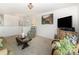 View of the living room showing the seating, media center, and decor at 1220 Kent Downs Sw Ave, Concord, NC 28027