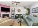 Comfortable living room with a fireplace, stylish decor, and ample seating for relaxing at 1220 Kent Downs Sw Ave, Concord, NC 28027