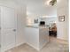 View of the cozy living room showcasing the decor, and lighting fixtures at 1220 Kent Downs Sw Ave, Concord, NC 28027