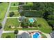 Aerial view of a home with a swimming pool and lush green landscaping at 1236 James Farm Rd, Hickory, NC 28602