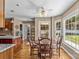 Cozy breakfast nook with hardwood floors, bright bay window with view of backyard at 1236 James Farm Rd, Hickory, NC 28602