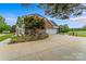 Charming brick home with a three-car garage and a beautiful driveway at 1236 James Farm Rd, Hickory, NC 28602