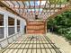 Back deck with a lattice pergola that offers shade and style at 14307 Hartwell Farm Dr, Charlotte, NC 28278