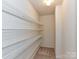 Walk-in closet with multiple shelves at 14307 Hartwell Farm Dr, Charlotte, NC 28278