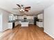 Spacious kitchen with black appliances, an island, and sleek countertops at 14307 Hartwell Farm Dr, Charlotte, NC 28278