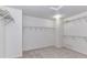 Walk-in closet with shelving and carpet flooring at 14307 Hartwell Farm Dr, Charlotte, NC 28278