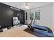 Dedicated exercise room with a motivational 'NO EXCUSES' theme featuring a treadmill, mirror, and ample space at 1507 Breckenwood Dr, Rock Hill, SC 29732