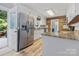 Bright kitchen with stainless steel appliances, stone counter tops, and classic white cabinets at 1507 Breckenwood Dr, Rock Hill, SC 29732