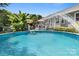 View of the above-ground pool and backyard deck featuring mature landscaping at 1507 Breckenwood Dr, Rock Hill, SC 29732