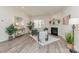 Spacious living room showcasing a fireplace, large window, and stylish decor at 1514 Starmount Cove Ln, Charlotte, NC 28210