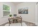 Cozy home office space with natural light and stylish decor for productive work or study at 1514 Starmount Cove Ln, Charlotte, NC 28210