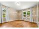 Bedroom featuring hardwood floors, lots of natural light and a view to the outdoors at 1617 Madison St, Rock Hill, SC 29732