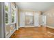 Bedroom featuring hardwood floors and a view to the outdoors at 1617 Madison St, Rock Hill, SC 29732