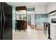 Open kitchen includes stainless appliances and bar pass-through to the living room at 1617 Madison St, Rock Hill, SC 29732