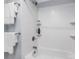 Bright white subway tile bathroom featuring bathtub, shower, and modern fixtures for a clean and sleek look at 1744 Emerywood Dr, Charlotte, NC 28210