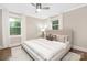 Inviting bedroom featuring natural light, neutral tones, and a comfortable bed at 1744 Emerywood Dr, Charlotte, NC 28210