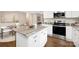 Modern kitchen with granite countertops, stainless steel appliances, and a breakfast bar at 1744 Emerywood Dr, Charlotte, NC 28210