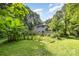 A spacious fenced backyard with mature trees at 204 S Deerfield Cir, Salisbury, NC 28147