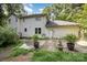 A house exterior with a brick patio and landscaped backyard at 204 S Deerfield Cir, Salisbury, NC 28147
