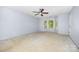 Spacious bedroom features a ceiling fan and a bay window to let in natural light at 204 S Deerfield Cir, Salisbury, NC 28147