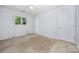 This bedroom features white trim, a ceiling fan, and a window at 204 S Deerfield Cir, Salisbury, NC 28147