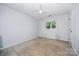 This bedroom has a neutral-toned wall, ceiling fan, and window with natural light at 204 S Deerfield Cir, Salisbury, NC 28147
