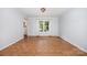 Bright living room with large windows providing natural light and view of the outdoors at 204 S Deerfield Cir, Salisbury, NC 28147