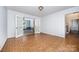 The large living room includes french doors that leads to an additional room at 204 S Deerfield Cir, Salisbury, NC 28147