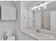 Bathroom features a stylish vanity, mirror, and updated fixtures at 222 Ross Moore Ave, Charlotte, NC 28205