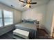 Cozy bedroom features a comfortable bed, window, and neutral décor at 222 Ross Moore Ave, Charlotte, NC 28205