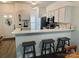Eat-in kitchen bar seating area with modern countertop and stainless steel appliances at 222 Ross Moore Ave, Charlotte, NC 28205