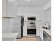Modern kitchen featuring stainless steel appliances, white cabinets, and a sleek design at 222 Ross Moore Ave, Charlotte, NC 28205