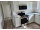 Modern kitchen featuring new stainless steel appliances and marble countertops at 2448 Cambridge Dr, Lancaster, SC 29720