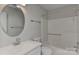Bathroom featuring a tub and shower combo, and white sink and toilet at 2706 Bremer Ct, Charlotte, NC 28210