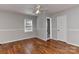 Bedroom featuring neutral walls, natural light, hardwood floors, and closet at 2706 Bremer Ct, Charlotte, NC 28210