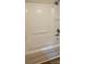 Clean bathroom features a shower and tub with white walls at 2828 Bellhaven Cir, Charlotte, NC 28214
