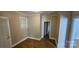 Comfortable bedroom featuring neutral walls, and a large window at 2828 Bellhaven Cir, Charlotte, NC 28214