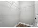 Walk-in closet features metal shelving and hardwood flooring at 3029 Marchers Trace Dr, Charlotte, NC 28227