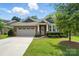 Charming single Gathering home with manicured lawn, brick facade and attached two car garage at 3029 Marchers Trace Dr, Charlotte, NC 28227