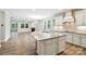 Gourmet kitchen with large island, granite countertops, and stainless steel appliances at 3029 Marchers Trace Dr, Charlotte, NC 28227