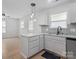 Kitchen features island and stainless appliances at 313 S Park Dr, Wadesboro, NC 28170