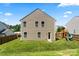 This backyard features a wood fence, playset, and grass at 329 Brannon Meadows Dr, York, SC 29745