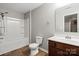 Bathroom featuring tile flooring, a combined tub and shower, and a modern vanity and mirror at 329 Brannon Meadows Dr, York, SC 29745