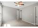 Bedroom showcasing a ceiling fan and plush carpeting in a room painted with neutral tones at 329 Brannon Meadows Dr, York, SC 29745