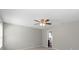 This bedroom features neutral carpeting and paint, a ceiling fan, and an ensuite bathroom at 329 Brannon Meadows Dr, York, SC 29745